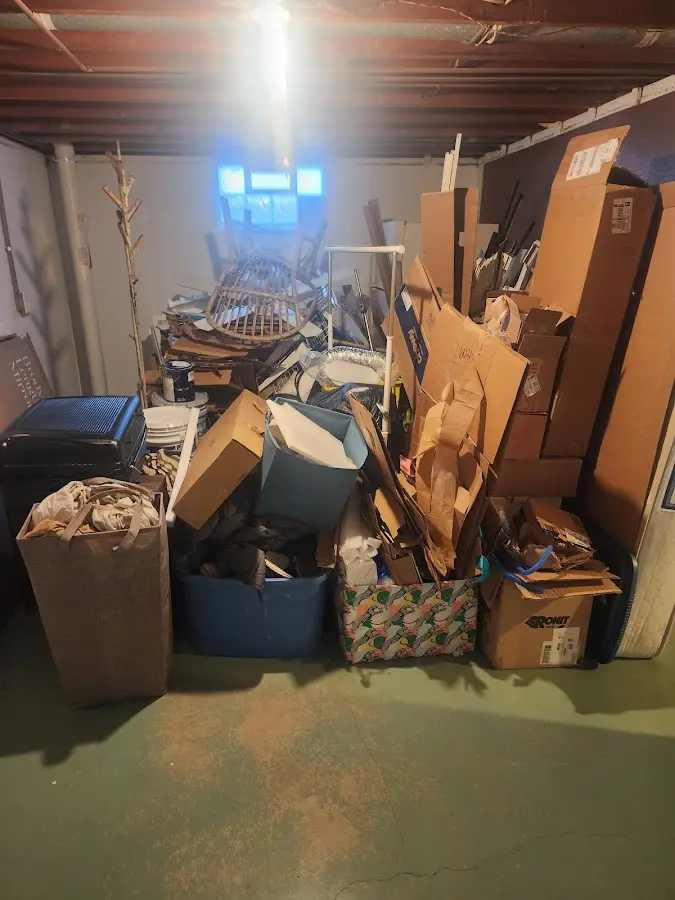 Roll-off dumpster container at job site for 4 Yard Dumpster Rental in Milford